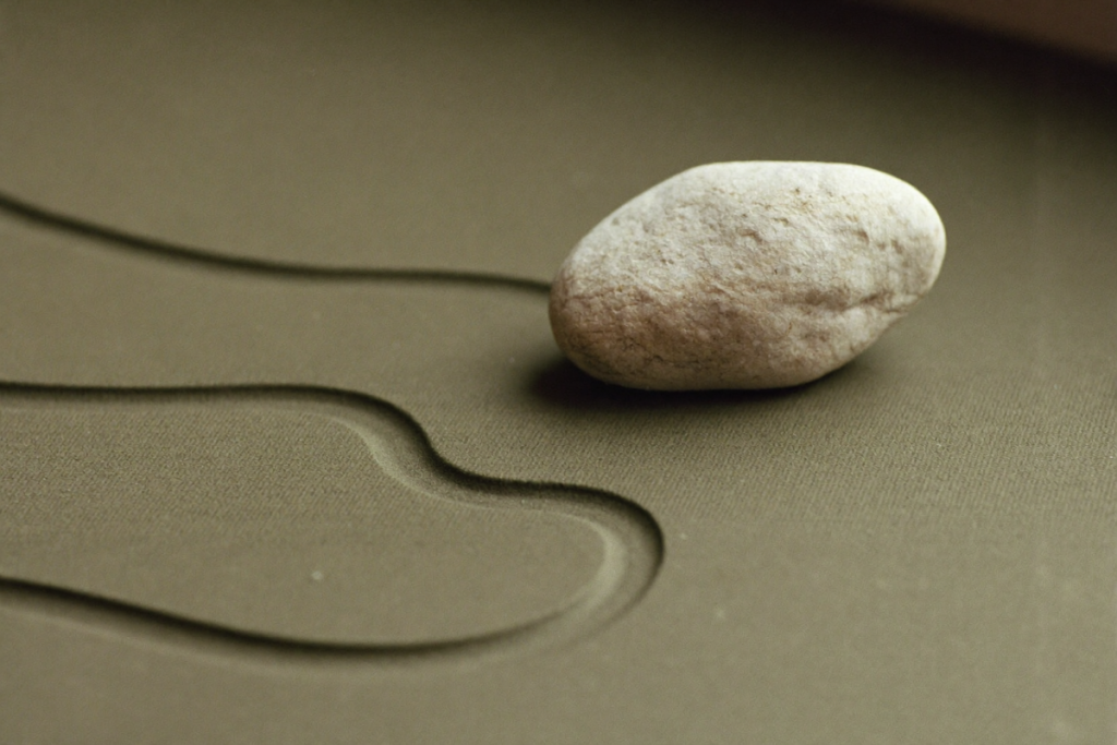 A stone settled at the low point of a curved groove, evoking a weight-loss plateau
