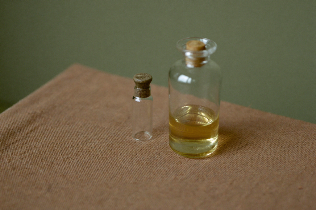 Two unlabeled vials side by side suggesting a comparison between sermorelin and growth hormone